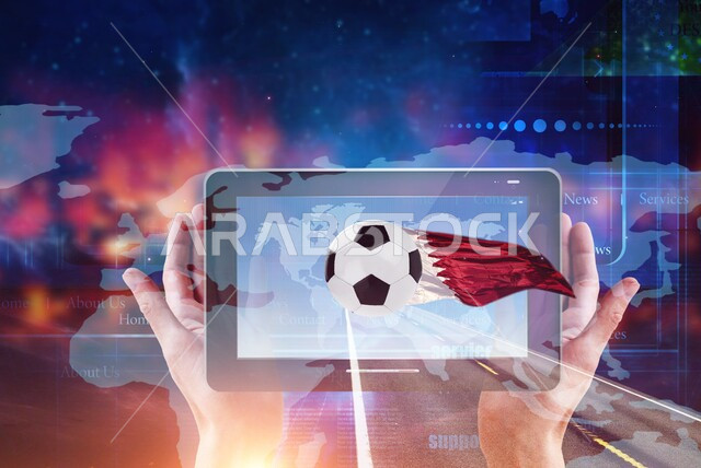 استخدام التقنيات الحديثة في الفعاليات الرياضية، مفهوم الاندية والتشجيع، صورة مقربة ليد شخص يحمل تابلت تعرض صور لكرة القدم مع العلم القطري، مشاهدة مباريات كاس العالم في قطر عبر الاجهزة الالكترونيه، خلفيه هولوجراميه ملونه ثلاثية الابعاد
