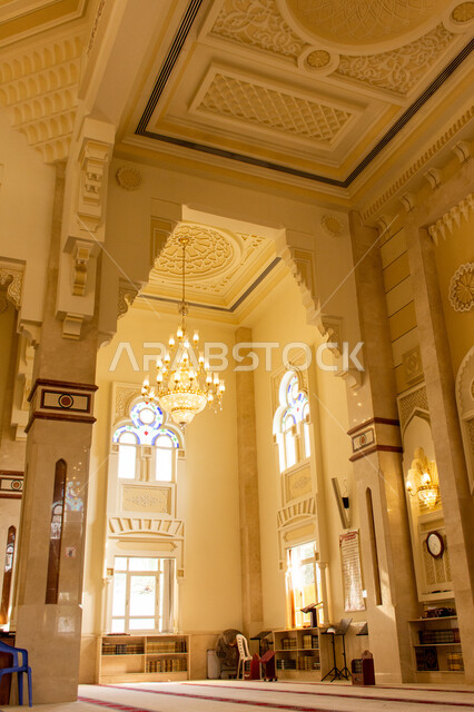 Reflection of sunlight through the window, distinctive interior designs and decorations of mosques in the modern Islamic style, a picture from the inside of a mosque in the city of Sharjah, spiritual religious atmosphere, sacred Islamic places in the United Arab Emirates, worship and closeness to God