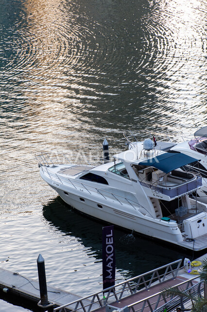 Distinctive marine transportation in the Palm Jumeirah area, recreational activities in the summer season, a yacht to transport tourists on a tour around Dubai Marina, famous places and tourist attractions in the United Arab Emirates
