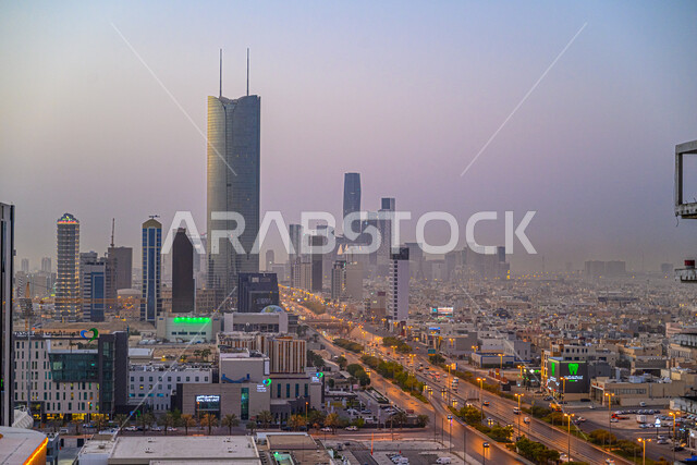 Technical architecture of skyscrapers in Saudi Arabia, economic and financial towers at sunset, famous commercial landmarks in Riyadh, development and urban engineering progress of the capital's buildings