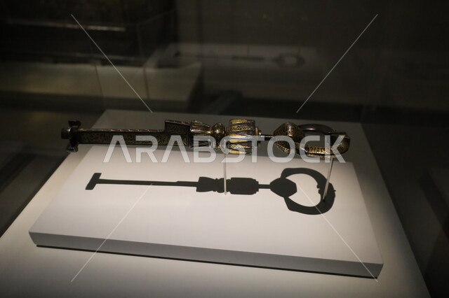 Distinctive religious artifacts and collectibles, tourist attractions and visitors to learn about the history of the Holy Land, Biennale Museum of Islamic Arts in the Kingdom of Saudi Arabia, famous cultural landmarks in the city of Jeddah, the key to the historic door of the Kaaba decorated with Islamic inscriptions