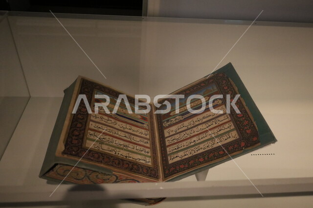A very old handwritten copy of the Holy Quran is on display at the Biennale Museum of Islamic Arts in Jeddah, the famous historical and cultural landmarks in the Kingdom of Saudi Arabia, attractions and destinations for tourists and visitors to learn about the history of the Holy Land, a display of the rarest Quranic manuscripts