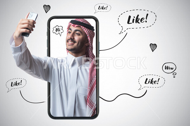 صورة مقربة لرجل عربي خليجي سعودي محددة باطار أيفون يقوم بأخذ صورة سيلفي له وعلى وجهه ابتسامة محاطة بمجموعة من الفقاعات التي تحتوي على التعابير و التفاعلات الخاصة بمواقع التواصل الاجتماعي السوشال ميديا بتقنية الهولوجرام ثلاثية الأبعاد .