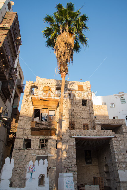 Old wooden doors and windows in the historic city of Jeddah, ancient Arab Islamic architectural art, historic houses in the historic city of Jeddah, popular heritage tourist places in the Kingdom of Saudi Arabia, historical landmarks in the Al-Balad district