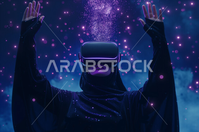 ارتداء نظارات الواقع الافتراضي الفي ار، الاندماج والتفاعل مع العناصر الهولوجرامية، تقنيات حديثة الكترونية وأجهزة تكنولوجية، صورة مقربة لامرأة عربية خليجية سعودية محجبة ترتدي العباءة التقليدية تقف وترفع يدها للأعلى في محاولة للمس المكونات الخيالية، خلفية ملونة