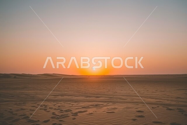 Golden Sunset Over Sandy Desert Landscape