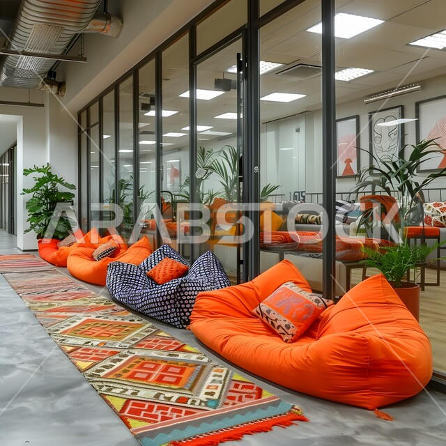 تجهيزات حديثة وأثاث أنيق ومريح، صالة الانتظار في إحدى الشركات, تصاميم عصرية لمكاتب السعودية، واجهات زجاجية ضخمة في مكاتب العمل، تصاميم داخلية وديكورات راقية على الطراز الحديث