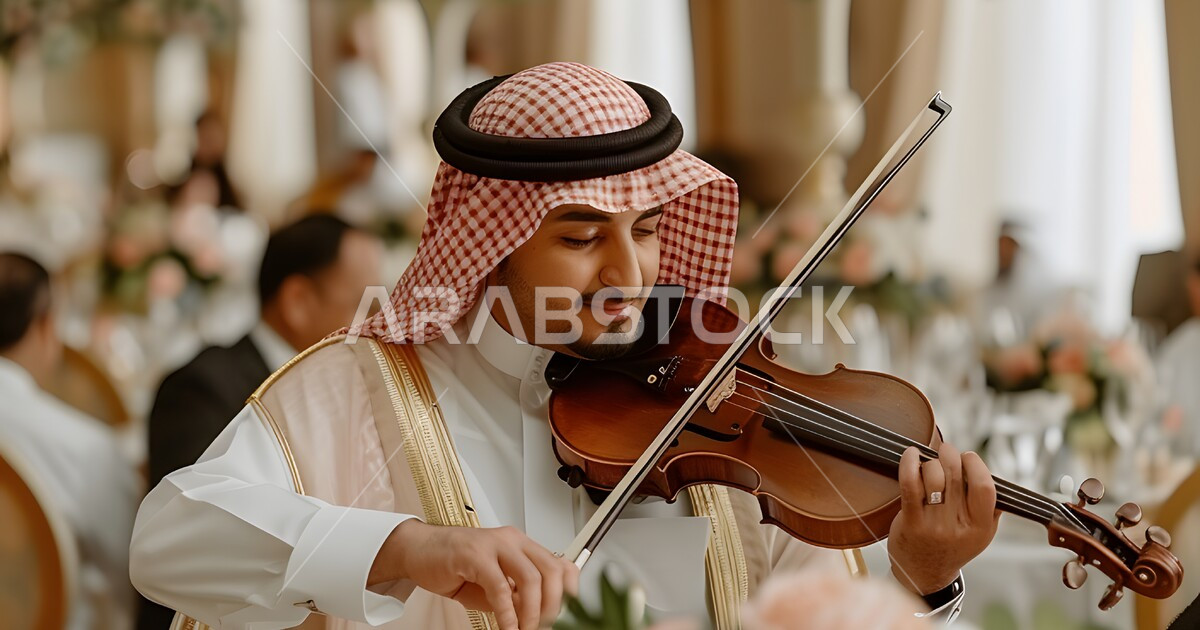 Saudi Arabian Instrument Playing soft, upscale music, close-up of a Saudi Arabian Gulf man ...