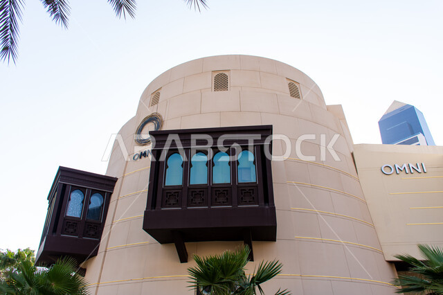 Balconies of an Islamic style building next to Wafi Mall in Dubai, Islamic architecture of wooden windows, urban growth and development in Dubai, modern architecture in the United Arab Emirates, famous tourist places and landmarks