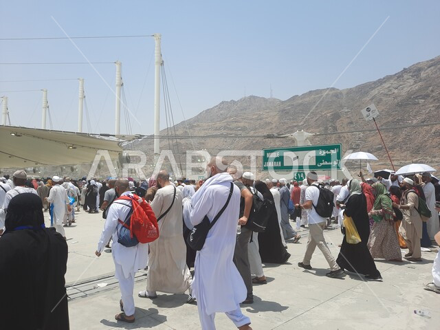Muslim pilgrims perform Hajj and Umrah rituals, Islamic religious holy places in Saudi Arabia, worship and drawing closer to Allah Almighty, visitors to the House of Allah walk in the Jamarat Bridge area in Makkah Al-Mukarramah