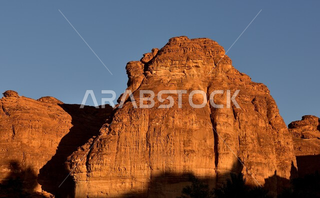 Ancient historical monuments, rock formations and formations during the day, natural sedimentary rocks, rock carvings in desert areas, places of attraction and attracting tourists from all over the world, famous tourist attractions in the Kingdom of Saudi Arabia