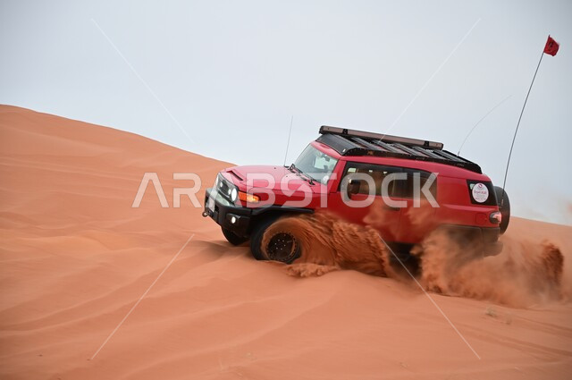 Fun desert activities, driving a four-wheel drive vehicle (dune bashing) in the middle of the desert, safari adventures on the sand dunes, an exciting adventure on the soft golden sands in the deserts of the Kingdom of Saudi Arabia, enjoying practicing hobbies