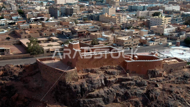 The famous historical and archaeological castle of Aaref, the building made of stones, the ancient architectural design of fortified military castles, heritage tourist places and attractions in Saudi Arabia in broad daylight.