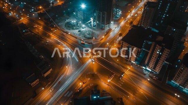 The growth and urban progress of the Kingdom Tower in Saudi Arabia, modern architectural art, view of the towers and skyscrapers in the city of Riyadh, car traffic in the streets and roads, famous tourist attractions
