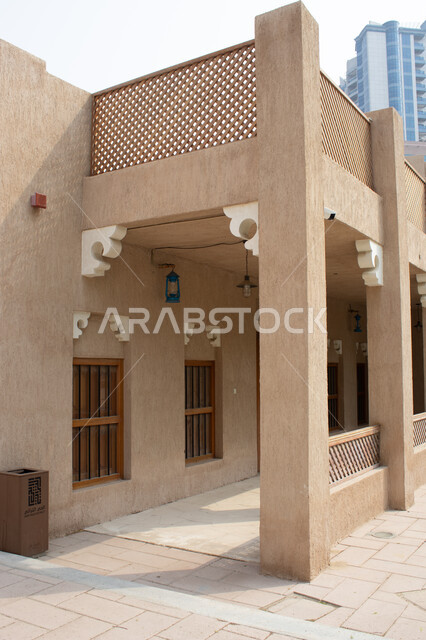 Historical landmarks, authentic Arab heritage and architecture in the past, old wooden doors in Ajman Museum in the United Arab Emirates, Emirati buildings and archaeological sites, destinations that attract visitors from around the world