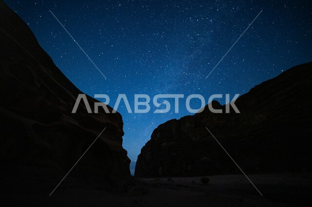 Desert areas in the wilderness at night, ancient historical monuments, famous tourist places in the Kingdom of Saudi Arabia, desert nature reserves, mountain ranges and rock formations and formations