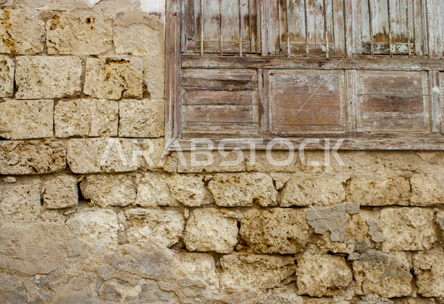 صورة خلفية لجدار حجري قديم بارز الشكل