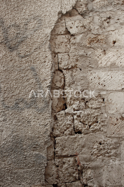 صورة خلفية لجدار حجري قديم بارز الشكل