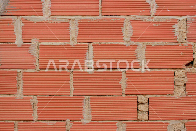 صورة خلفية لجدار حجري قديم بارز الشكل