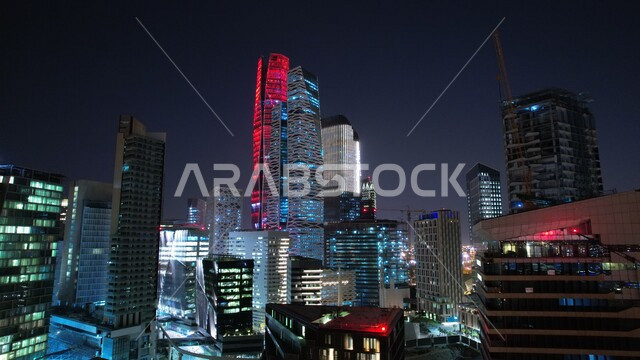 An aerial view of the King Abdullah Financial District (CAFD) in Riyadh, Saudi Arabia, a picture of financial and economic towers and architectural facilities at night, tourism in Saudi Arabia, a wonderful view of the King Abdullah Financial Center in Riy