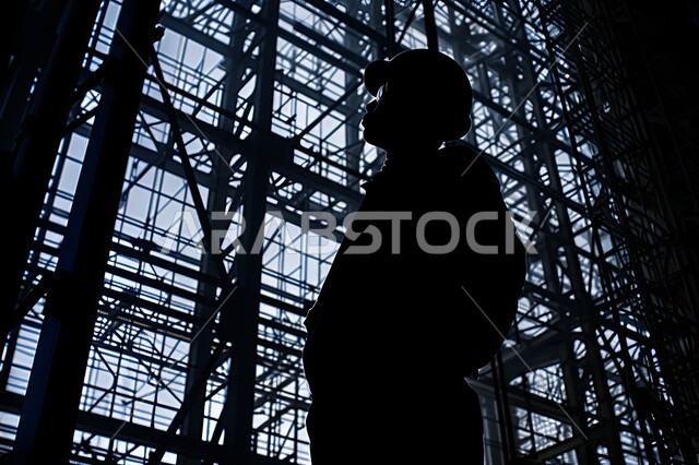 Auditing and supervision in industrial laboratories, factories of the Kingdom of Saudi Arabia, working in the industrial field, jobs and professions for youth in the Kingdom of Saudi Arabia, silhouette of a Saudi Arabian Gulf engineer wearing a jacket and a protective helmet walking around the factory, Saluit