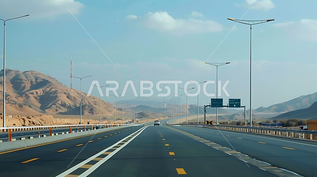 الحركة المرورية للسيارات في طريق صحراوي في المملكة، الطريق السريع الواصل بين الرياض والقصيم، طرق وشوارع اسفلتية في المناطق الصحراوية الطبيعة في السعودية، القمم والمرتفعات الجبلية 