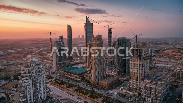 Building a civilized and advanced future, high-rise commercial buildings and facilities in the Kingdom of Saudi Arabia, a Saudi future vision 2030, the architectural engineering art of towers and skyscrapers, an imaginative future view of urban progress and growth