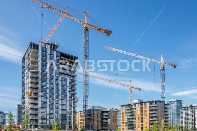 مفهوم الهندسة الإنشائية والمعمارية, رافعات البناء وصب الخرسانات ووضع الأساسات, تنفيذ مخطط الإعمار وتشكيل الهيكل المعدني, مبنى حديث قيد الانشاء, التوسع العمراني في المملكة العربية السعودية