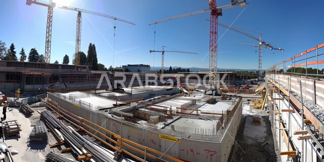 رافعات بناء وصب الخرسانات ووضع الاساسات, الحضارة والتطور والتقدم العمراني في المملكة العربية السعودية, مجموعة من المباني السكنية قيد الانشاء, تحسين وتطوير البنية التحتية, مفهوم الهندسة الإنشائية والمعمارية, تنفيذ مخطط الإعمار وتشكيل الهيكل المعدني