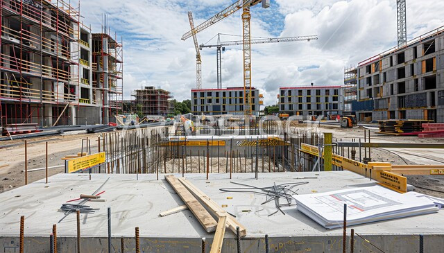 Concrete construction site under construction, Saudi urban development and progress, improvement and development of infrastructure in the Kingdom of Saudi Arabia, concept of structural and architectural engineering, implementation of the construction plan and formation of the metal structure