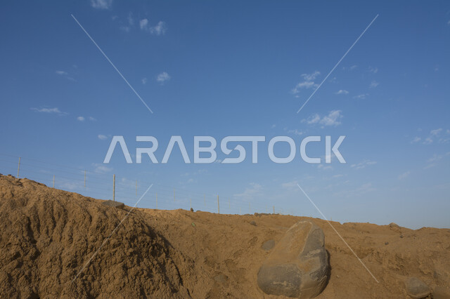 Mountain peaks and heights in Saudi Arabia, dangerous terrain, slopes and foothills, rock formations and mountain ranges, nature reserves in the wilderness, dry wild environment and sandy soil, nature background