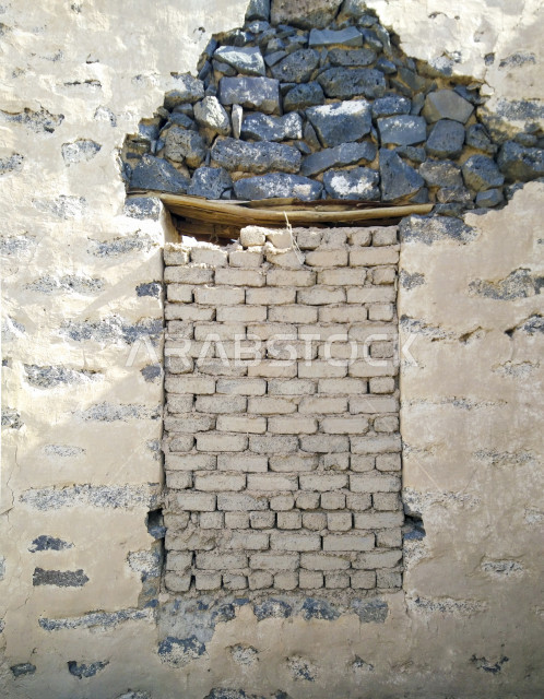 صورة خلفية لجدار حجري قديم بارز الشكل