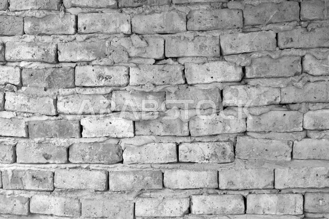 صورة خلفية لجدار حجري قديم بارز الشكل