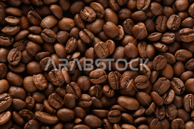 حبوب البن (بذرة نبات القهوة) نوع من أنواع المشروبات المنشطة ذهنياً ,بذور البن المحمصة , بذور البن الطازجة الطبيعية 