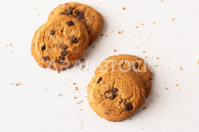 Homemade hot chocolate wafers, light and fluffy biscuit chips, white background