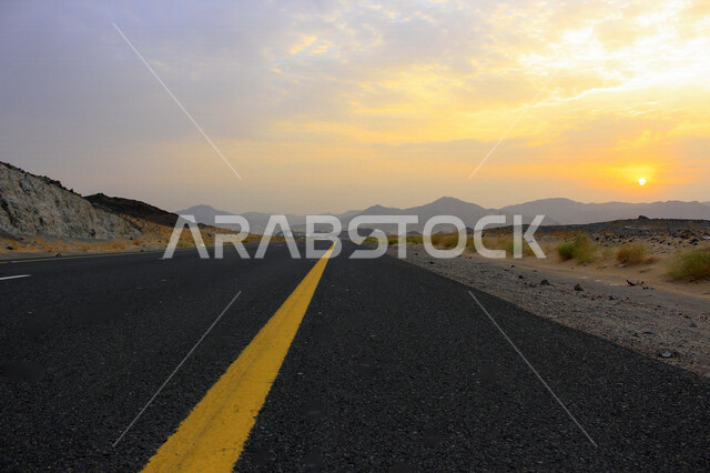 Beautiful view of the highway in Taif, Saudi Arabia, with a background of mountainous heights and desert sand, image on the twisting highway in Saudi Arabia