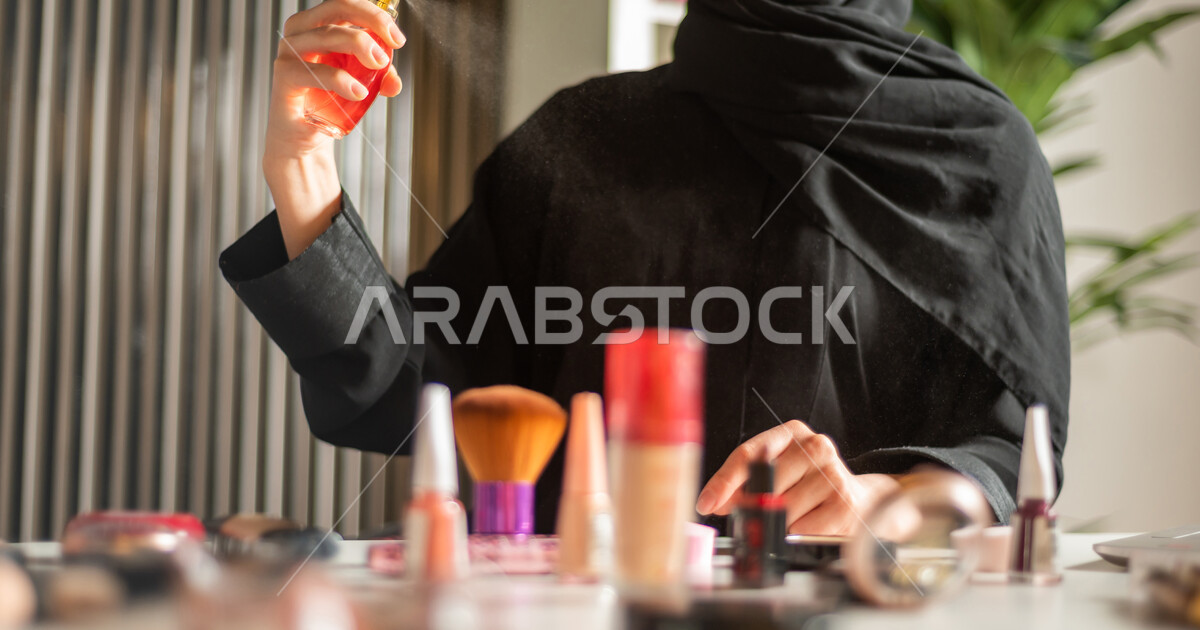 A veiled Saudi Arabian Gulf makeup saleswoman, an expert in cosmetics