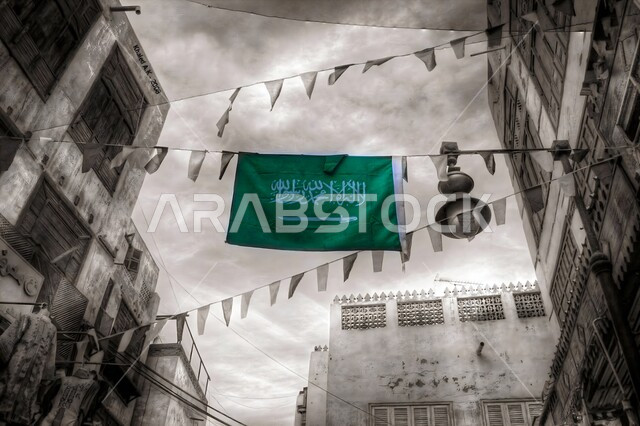 ذكرى العيد الوطني 23 سبتمبر، الاحتفال بيوم العلم 11 مارس، صورة مقربة لعلم المملكة العربية السعودية، راية التوحيد والإسلام وشعار الهوية الوطنية، مفهوم حب الوطن والانتماء اليه، الاخلاص والولاء للبلاد، احتفالات بالمناسبات والاعياد الوطنية