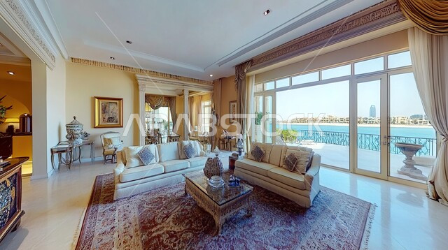 التصاميم الأنيقة لغرف الجلوس المريحة على الطراز الحديث, الواجهات و النوافذ الزجاجية الكبيرة, غرفة معيشة مع أثاث منزلي فاخر, الديكورات الداخلية الراقية, فلل و شقق سكنية في المملكة العربية السعودية