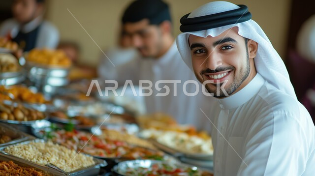 Gestures of happiness in spending a good time with friends, a gathering of friends at a delicious breakfast table, a dining table filled with delicious food and appetizers, a lunch invitation for Arab Gulf Emirati businessmen wearing traditional dress eating food in one of the luxurious restaurants
