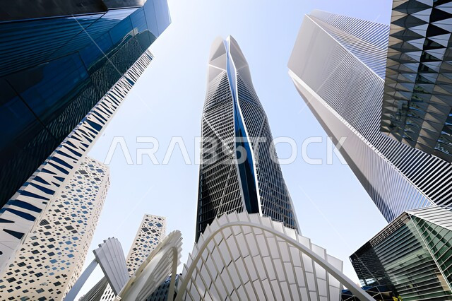 High-rise buildings, residential and commercial facilities in Riyadh during the day, famous landmarks and tourist places in the Kingdom of Saudi Arabia, attracting tourists from all over the world, the architectural art of building towers and skyscrapers in the modern style