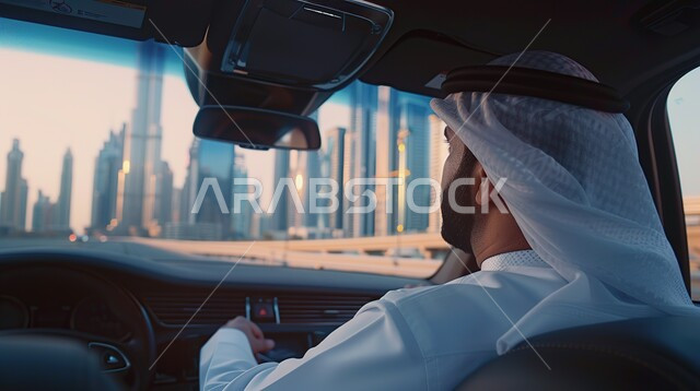 Having fun outside, architectural art of towers and skyscrapers in UAE, back view of an Arab Emirati Gulf man in kandura and ghutra looking at something and sitting inside a car, going for a walk on holidays