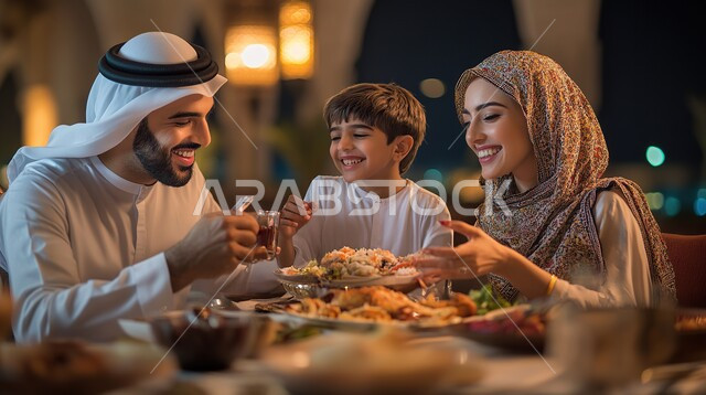 Happy family atmosphere, spending fun with the children, gestures of joy and pleasure, expressions of joy and happiness, family dialogues and discussions, a close-up of a Saudi-Gulf Arab family gathered around the dining table