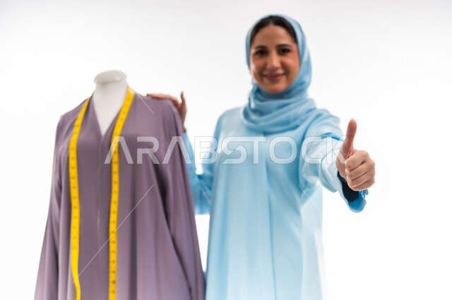 Invention and innovation of new and modern models, the importance of women in the field of sewing, fashion design workshop, women's professions and artistic works, arts and skills of tailoring women's clothing, the concept of the world of fashion and fashion