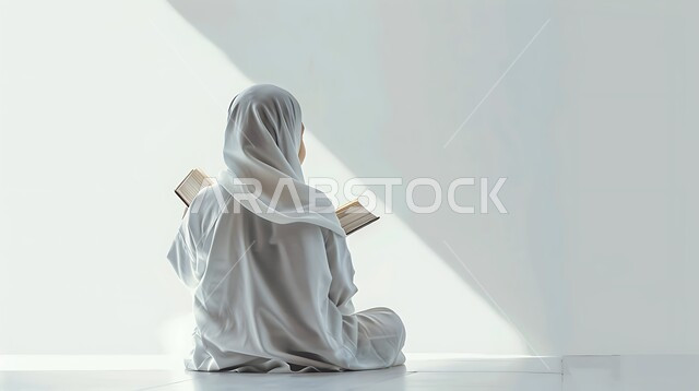 الإكثار من الذكر والإجتهاد في العباده، الشعور بالخشوع والطمأنينه,بورتريه من الخلف لطفلة خليجية سعودية ترتدي ثوب الصلاة تقوم بتلاوة وقراءة القرآن الكريم، التوبة والرجوع الى الله تعالى