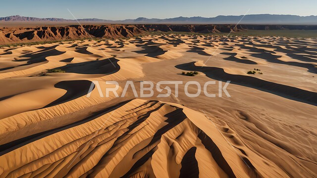 مناطق البادية والبيئة الطبيعية الصحراوية في وقت النهار، المرتفعات و التضاريس والقمم الجبلية في البراري، الهضاب و التلال من الرمال الناعمة الذهبية، التشكلات و التكوينات الرملية في صحراء المملكة العربية السعودية،  خلفية الطبيعة