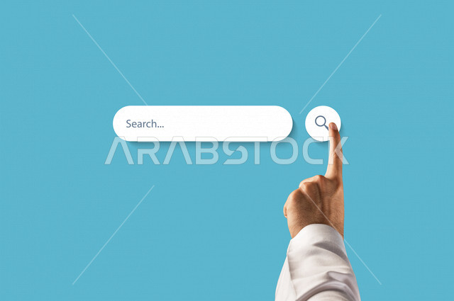 Close-up of the hand of a Saudi Arabian Gulf man, pressing his finger on the search button, the search content entry banner, search icons, technology and search system, internet search mechanism