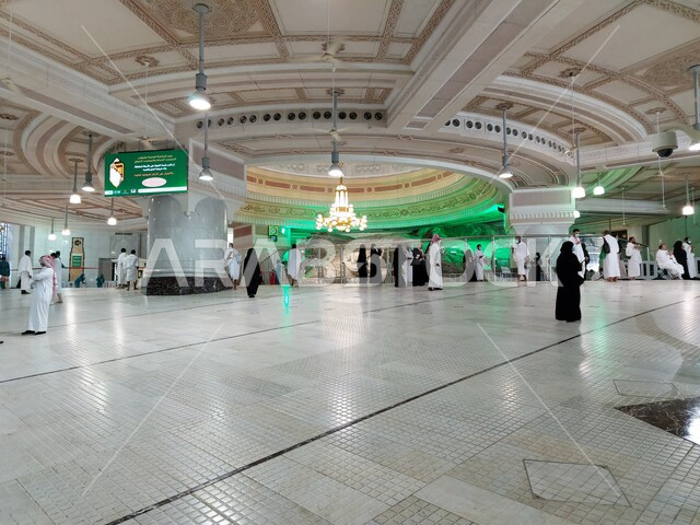 Islamic religious places and landmarks, Performing Hajj and Umrah rituals, Pilgrims and Umrah performers wearing Ihram clothes in Mas'a in Mecca, Saudi Arabia, Worship and drawing closer to Allah, Sa'i between Safa and Marwa, Islamic architectural art