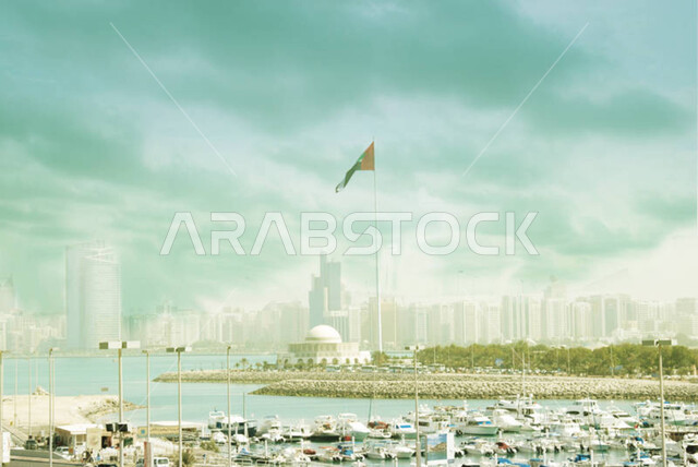 علم دولة الإمارات العربية المتحدة يرفرف في السماء، بناء مستقبل حضاري متطور في دبي، المنشآت والمباني التجارية الشاهقة، الفنون والتصاميم المعمارية الحديثة، الأبراج وناطحات السحاب في الامارات العربية المتحدة