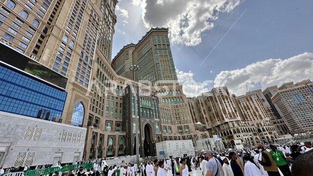 Muslims coming from all over the world to perform Hajj and Umrah, the architectural art of the Mecca Clock Tower overlooking the Grand Mosque, pilgrims to the House of God in the Holy Mosque in Mecca, Saudi Arabia, sacred Islamic religious places and landmarks